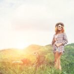 beautiful-hipster-woman-standing-green-meadow-with-nature_1150-809