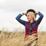 beautiful-woman-surrounded-by-wheat-posing_23-2148315753