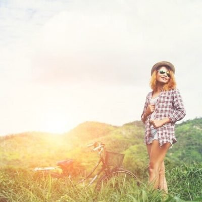 beautiful-hipster-woman-standing-green-meadow-with-nature_1150-809